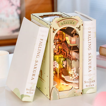 Enter a serene world of cherry blossoms with this DIY book nook, where graceful Eastern architecture blends beautifully with the delicate fall of sakura petals.

Pieces: 240
Assembly Time: ~3 hours
Difficulty Level: ⭐⭐⭐⭐
Assembled Size: H: 9.8″ (25cm) × W: 4.3″ (11cm) × D: 7.5″ (19cm)